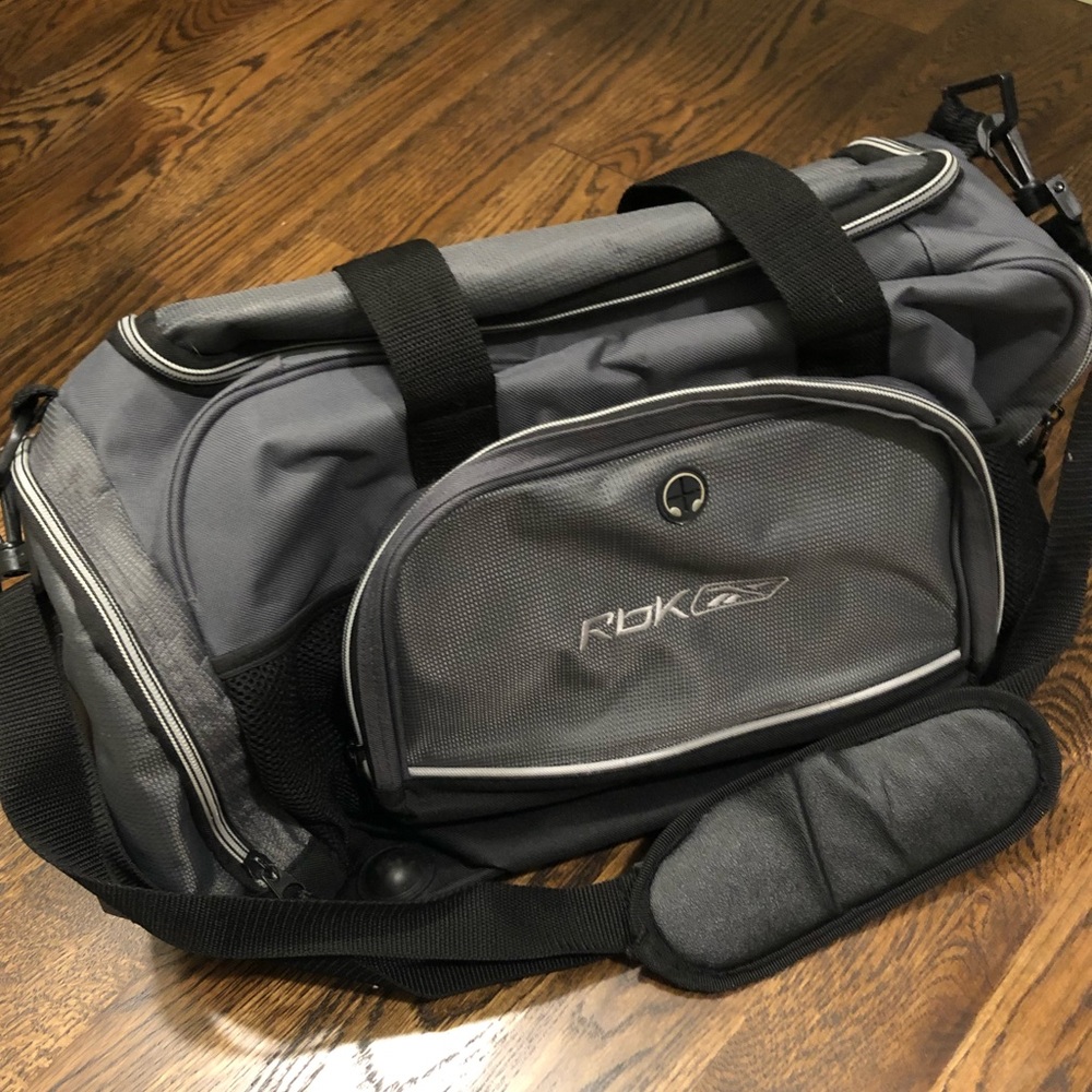 Grey Reebok gym bag.
